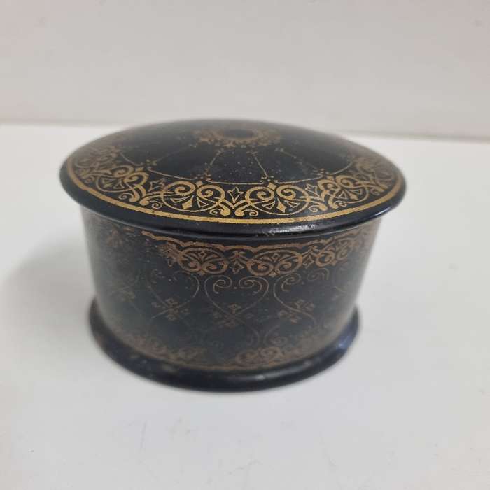 Vintage container with gold detail