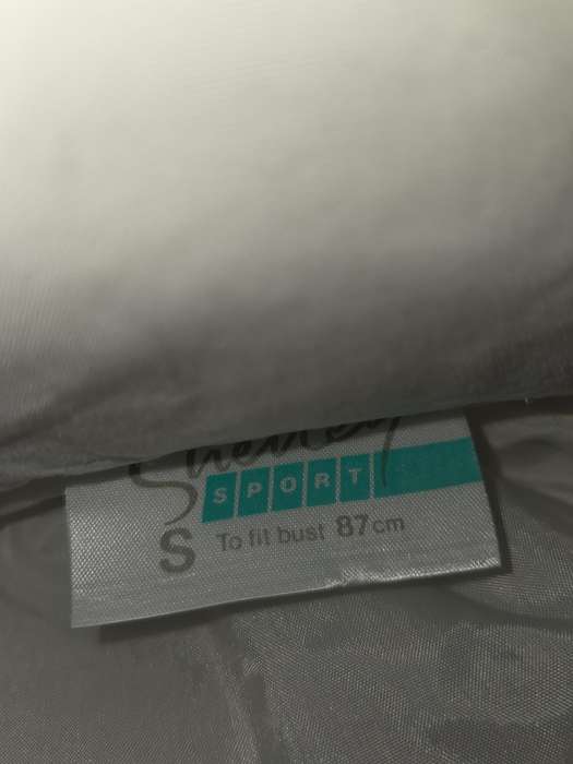 Shelley Jacket with hood that is stored in zipped collar - Size S
