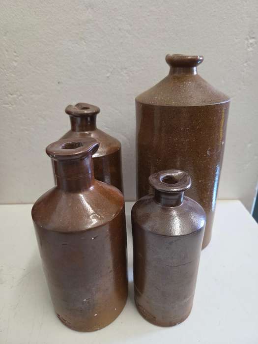 Collection of 4 Vintage Stoneware bottles