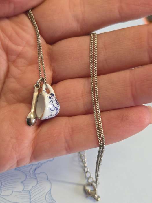 Necklace with cup and spoon pendant