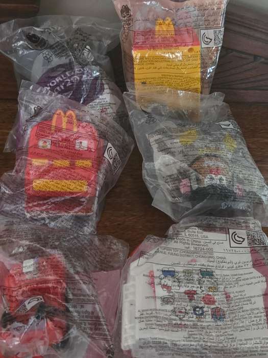 6 x MacDonald's Toys - Unopened -  incl. Hello Kitty, Transformers, Fifa World Cup 2022 etc.