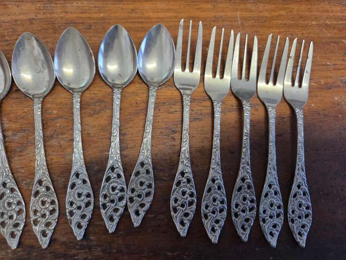 13 Piece vintage teaspoon and cake fork set with sugar spoon and jam spoons