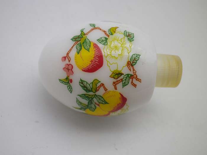Vintage AVON, milk glass egg shaped perfume bottle.
