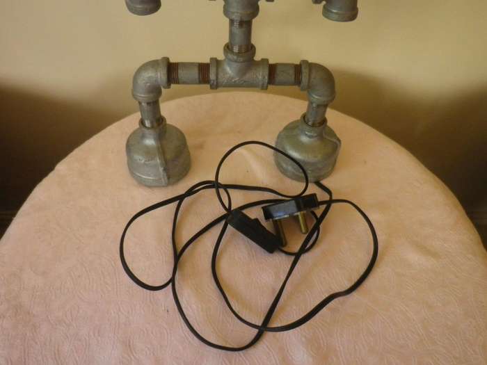Industrial "ROBOT" Bespoke Table lamp. Made with plumbing parts. Working. Globe Included