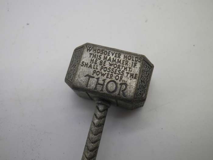 Cool THOR'S Hammer pendant. copyright MARVEL. Silver color metal on material thong.