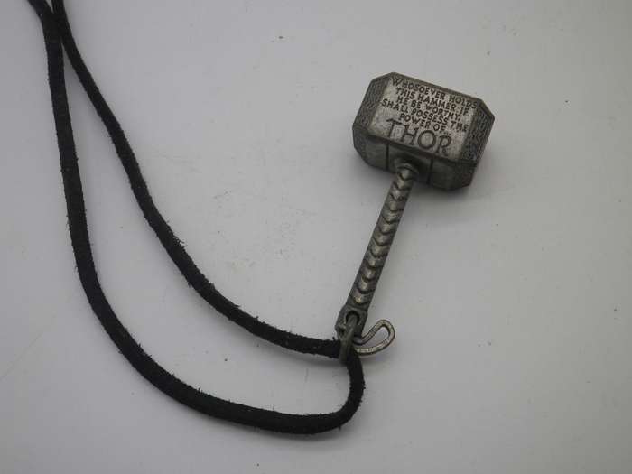 Cool THOR'S Hammer pendant. copyright MARVEL. Silver color metal on material thong.