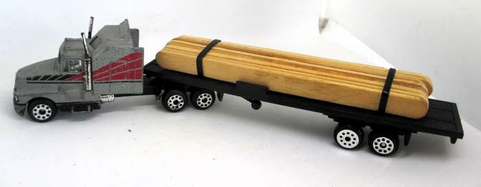 K6 Kenwoth T660A Truck with trailer and load.