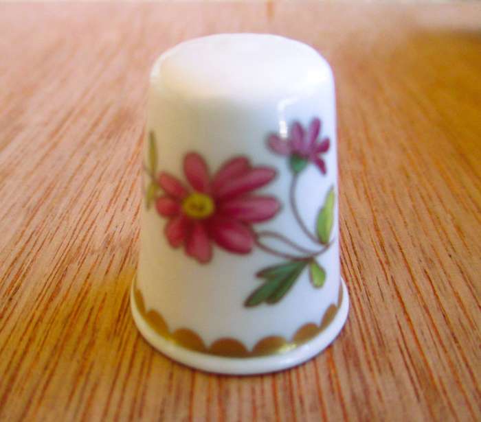Vintage Spode Bone China Thimble with flowers and gold rim.
