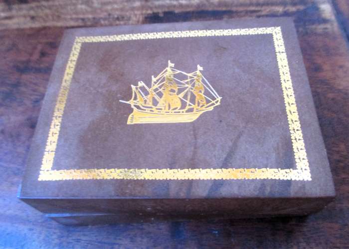 Vintage gold color cufflinks in box.