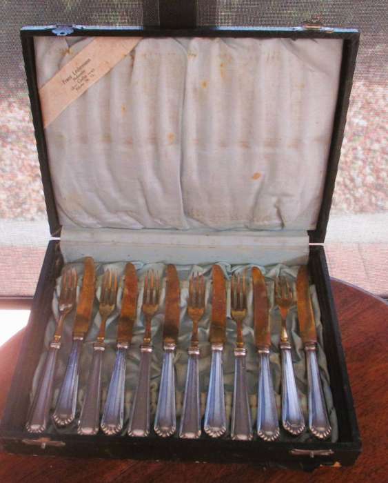 Lot of 12 1930's Silver and brass Fruit knifes and forks. Marked BSF 90. In box.