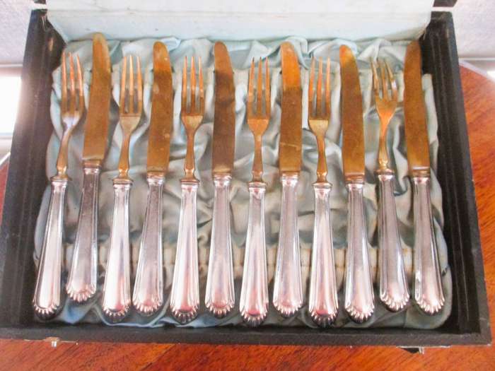 Lot of 12 1930's Silver and brass Fruit knifes and forks. Marked BSF 90. In box.