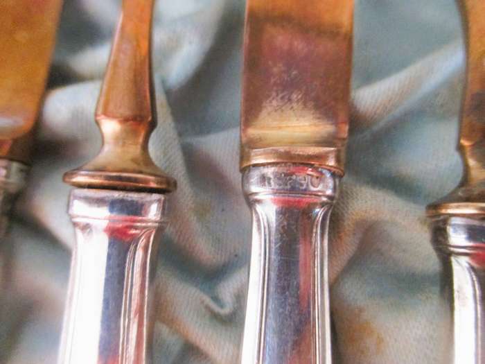 Lot of 12 1930's Silver and brass Fruit knifes and forks. Marked BSF 90. In box.