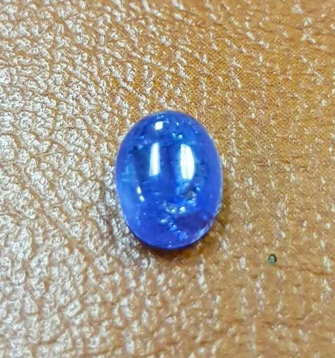 2.75Cts Tanzanite Purplish Blue  Oval Cabochon 7x9MM. Ravishing Colour & Full Fire!