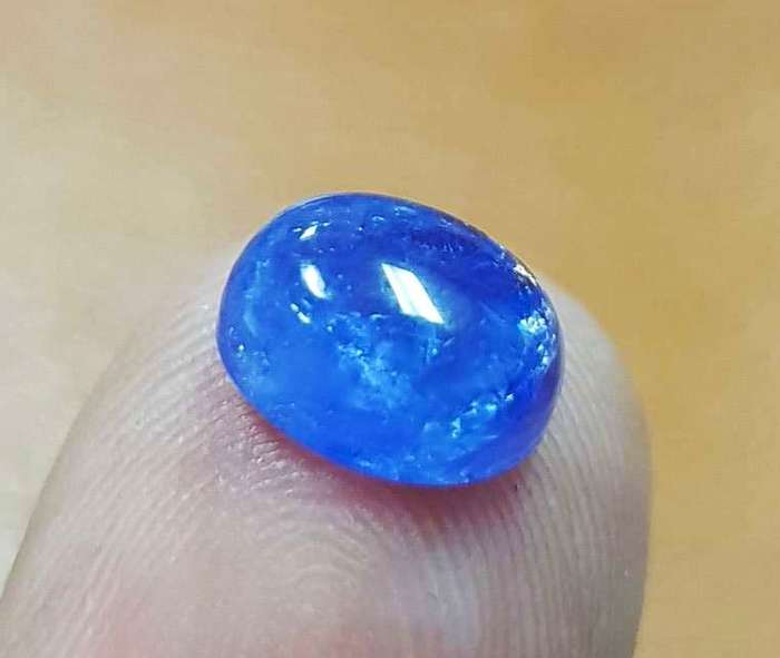2.75Cts Tanzanite Purplish Blue  Oval Cabochon 7x9MM. Ravishing Colour & Full Fire!