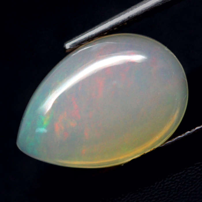 2.06Ct.  Opal Pear Cabochon Multi Colors Glittering Rainbow 3D Ethiopian Gemstone