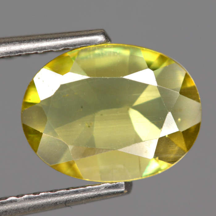 0.95Ct. Sphene Yellowish Green Oval Untreated Madagascar Very Good! Natural