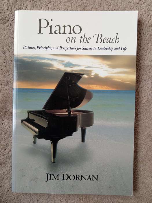 Piano on the Beach by Jim Dorman
