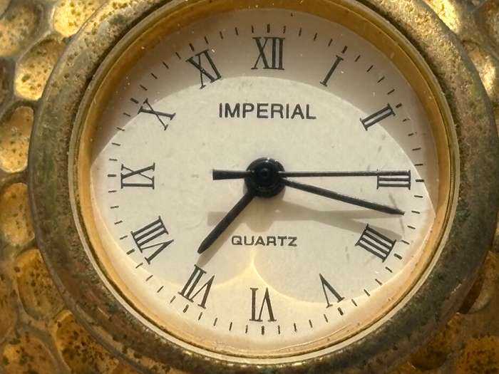 Miniature clock pair imperial brass golf ball  and B mantle clock Japan made