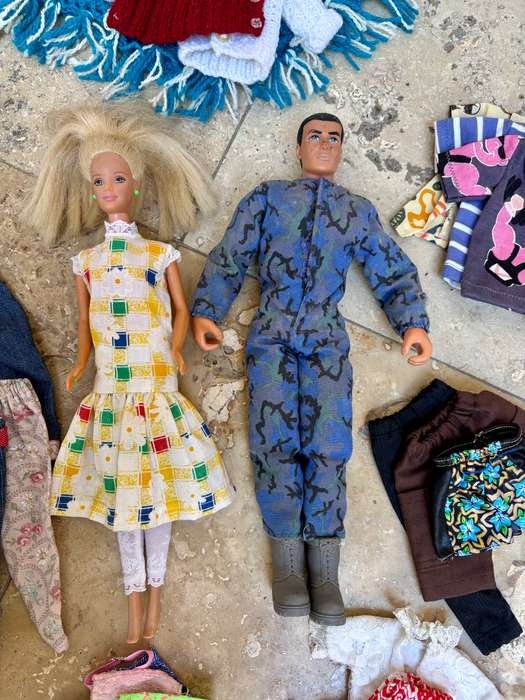 Vintage Barbie and Ken doll pair with extra clothes lot