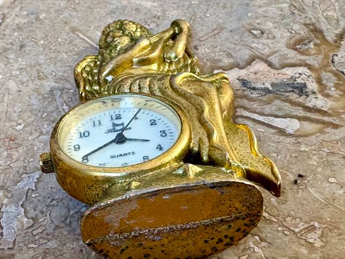 Vintage miniature quartz clock brass angel playing banjo
