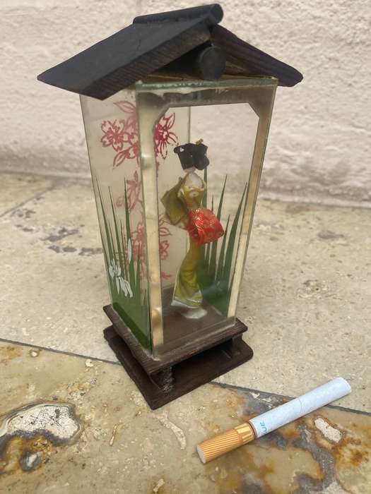 Vintage geisha doll in Perspex glass case with wooden roof