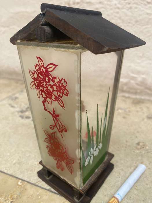 Vintage geisha doll in Perspex glass case with wooden roof