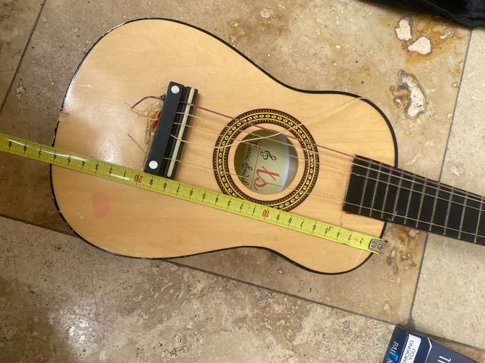 Beginners small 6 string guitar by TS music fidelity with carry bag , needs new string