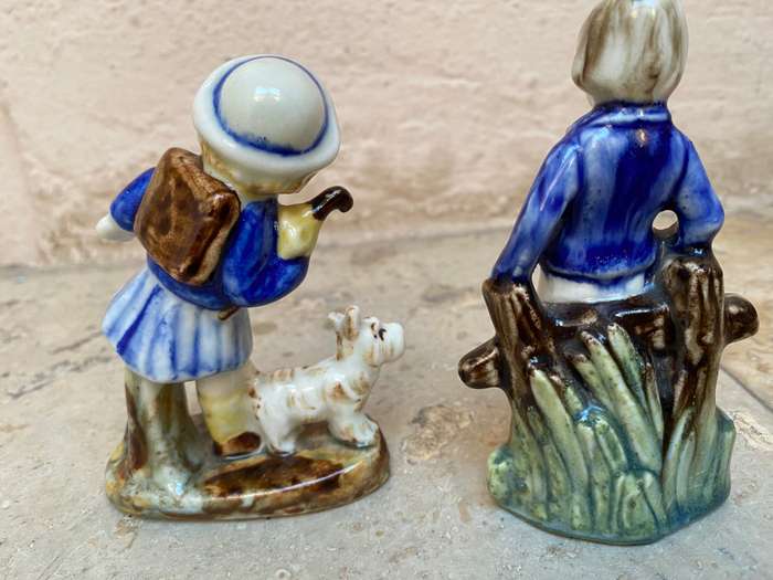 Vintage ceramic porcelain figurine pair , child with dog and soldier
