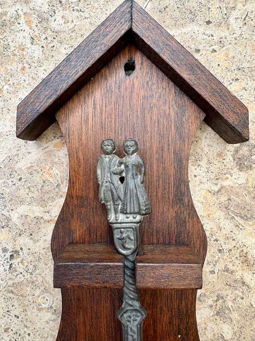 Pewter spoon decorative on wood wall mount