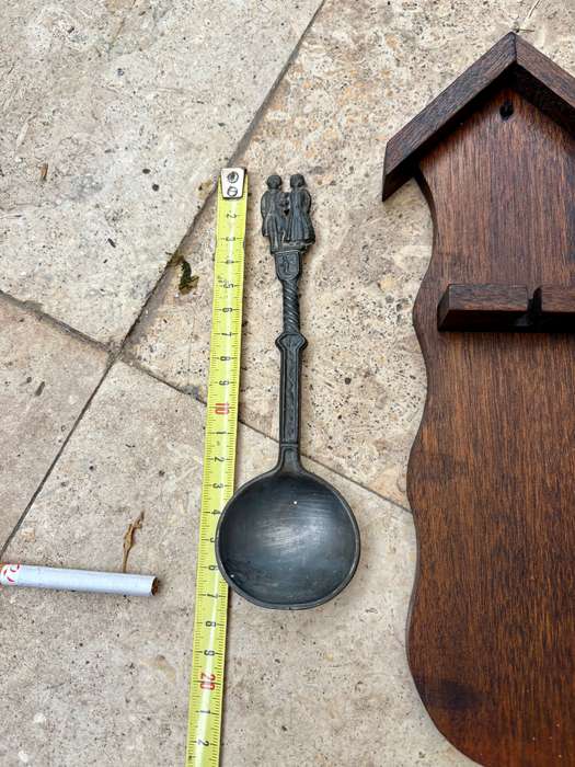 Pewter spoon decorative on wood wall mount