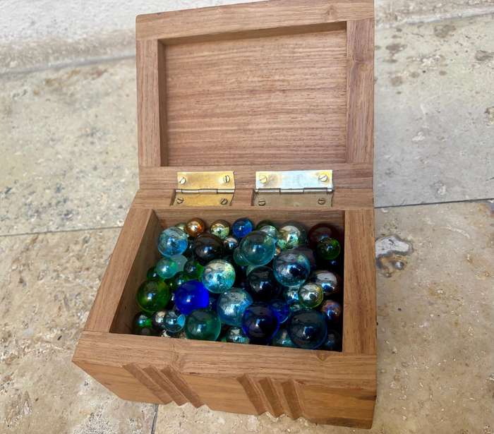 Vintage exotic Wood carved box filled with vintage soda marbles
