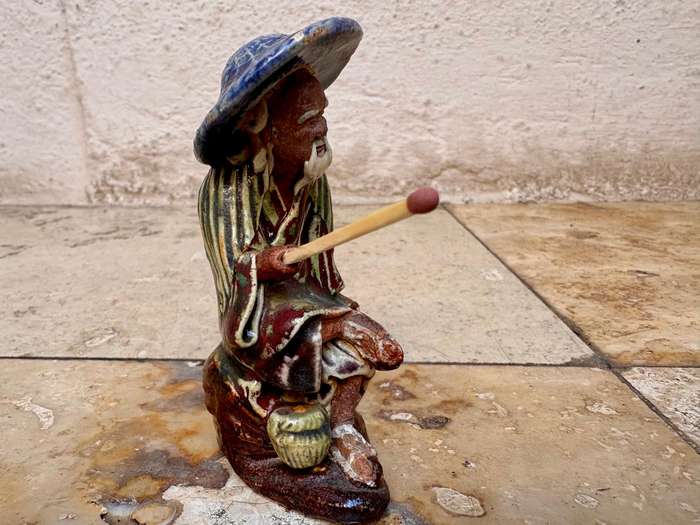Vintage Chinese mud man figurine
