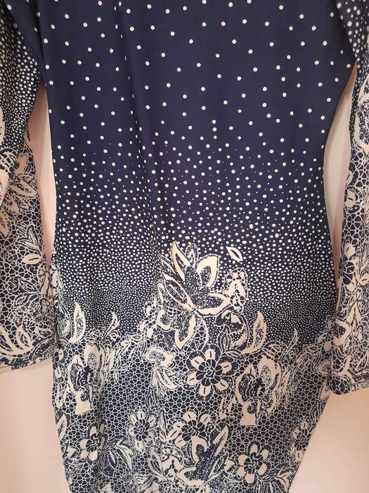 Navy blue long sleeve polkadot dress. Second-hand. Only been worn once