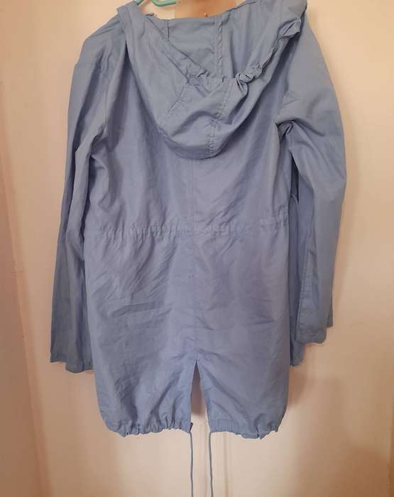 Womens Light blue raincoat ( Second-hand) Only been worn once. Size 8