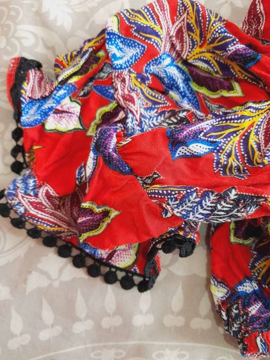 Red floral crop top with tassels