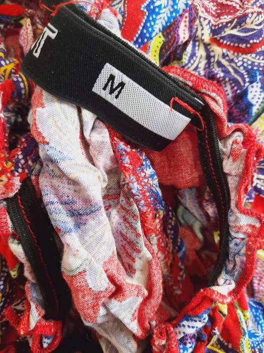 Red floral crop top with tassels