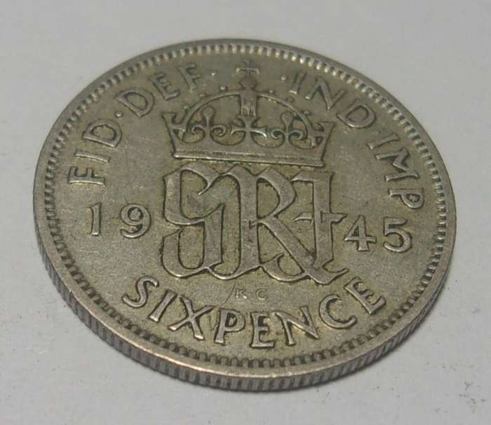 1945 silver British 6 Pence coin