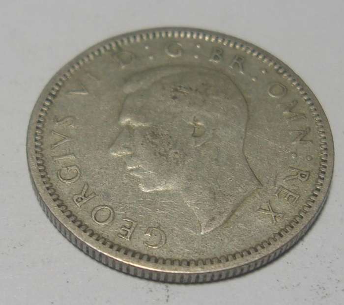 1945 silver British 6 Pence coin