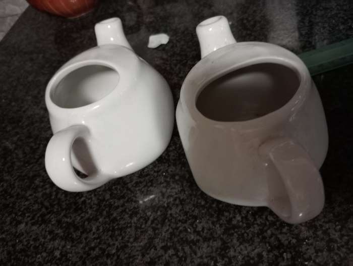 2 VINTAGE ONEIDA MILK JUGS
