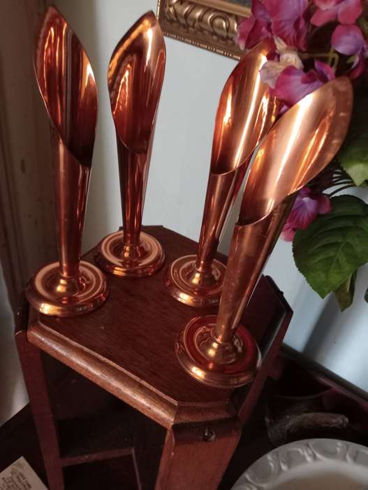 4 COPPER CANDLEHOLDERS
