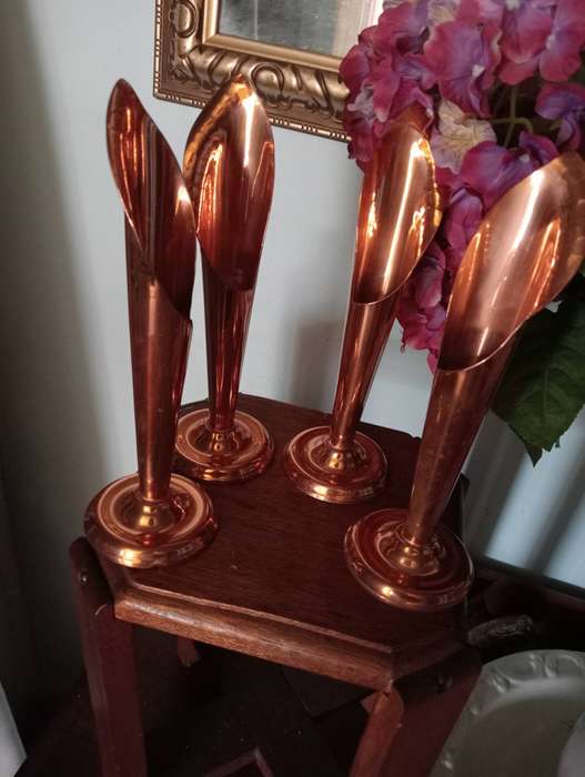 4 COPPER CANDLEHOLDERS