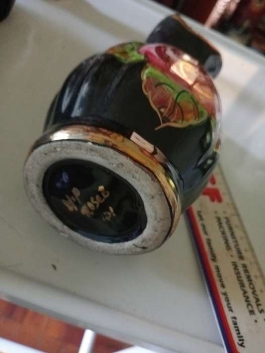 ANTIQUE BLACK PORCELAIN VASE