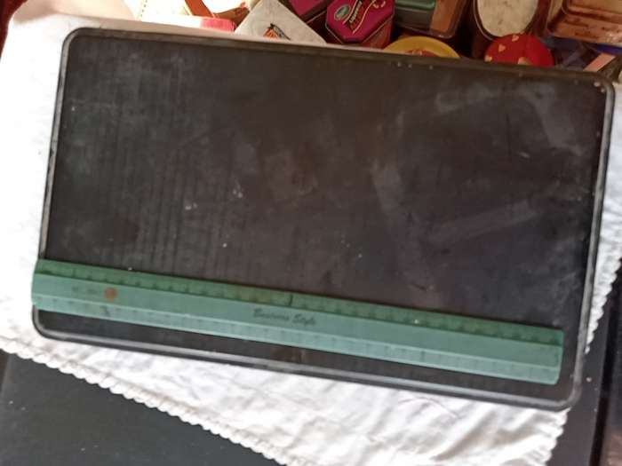 VINTAGE BLACK BISCUIT TIN