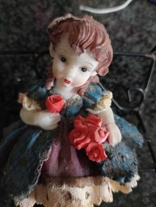 VINTAGE SMALL DOLL ON CHAIR