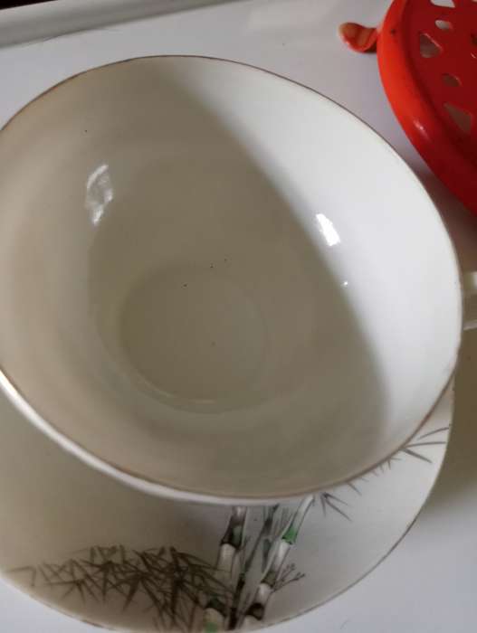 VINTAGE COLLECTABLE BLACK AND WHITE CUP AND SAUCER