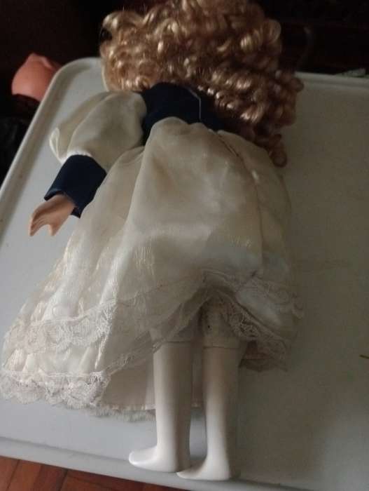 VINTAGE PORCELAIN DOLL