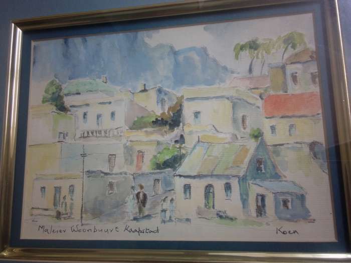 Popular SA Artist Marie Koen Glass Framed Watercolour "Woonbuurt Kaapstad" Signed