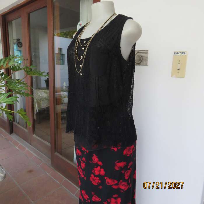 Black sleeveless 2 layer top size 36 with top layer in textured stretch sequined mesh.