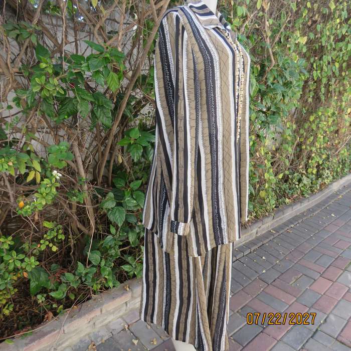 LARGELY FEMININE 2 pc polyester A-line skirt and long sleeve top outfit. Vertical striped. Size 42