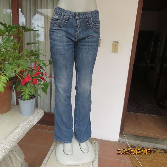 Sexy high quality blue denim stretch polycotton bootcut jeans. Size 32-34. With 5 pockets. As new
